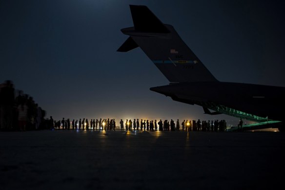 US Air Force aircrew oversee an evacuation flight from Afghanistan. 