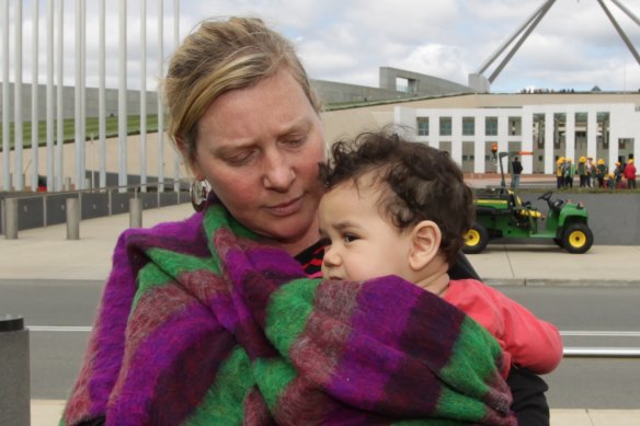 A single mother outside Parliament House in 2012 protesting against Labor’s cuts to the single parenting payment.