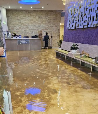 Hotel guests had to wade through water, which tourist Michael Watson compared to scenes from the movie Titanic.