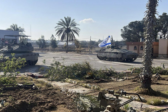 A tank with an Israel flag on it entering the Gaza side of the Rafah border crossing on Tuesday.