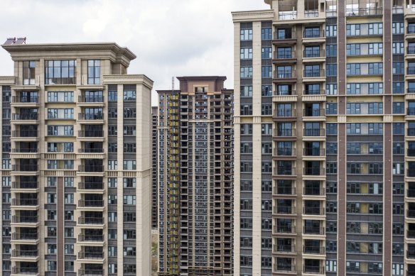 Residential buildings under construction at the Tao Yuan Tian Jing project developed by China Evergrande in Yangzhou.