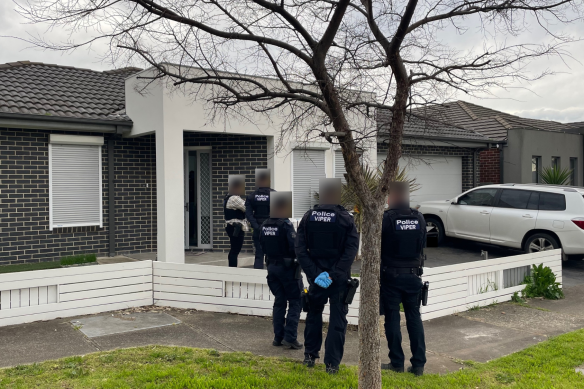 Officers from the Viper taskforce outside an Epping home where Yasir Al Qassim was arrested on Monday.