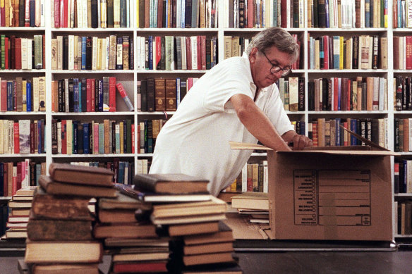 Larry McMurtry unloads books in his Archer City shop.