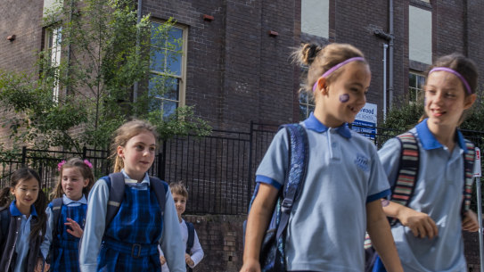 Parents and students outside Chatswood Public School. 