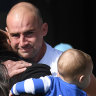 Emotional scenes: Ben Cunnington with his family before the game.