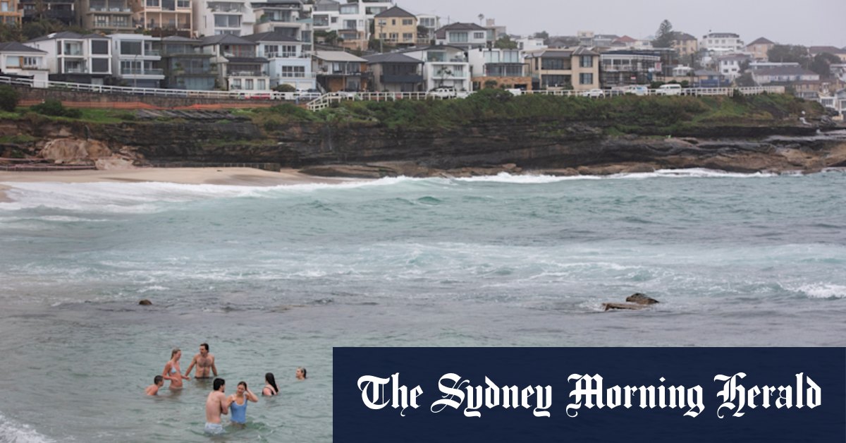 Sydney cops a soaking ahead of storm threat, severe weather warnings issued around the state