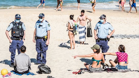 Police patrolled Bondi Beach on Saturday following the announcement of a crackdown on the enforcement of restrictions.