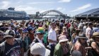 A crowd gathers at Sydney Harbour.