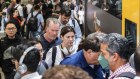 Crowds pack into trains at Chatswood on Wednesday.