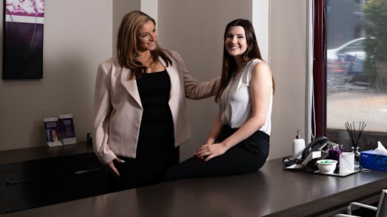 Adriana Care with Elyse Strahan, a young employee in her Narellan law practice. 