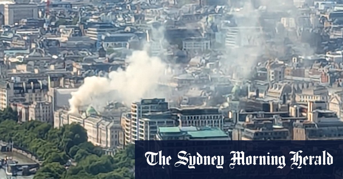 Firefighters tackle huge blaze at historic building on the Thames