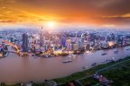 Ho Chi Minh City and the Mekong River at sunset.