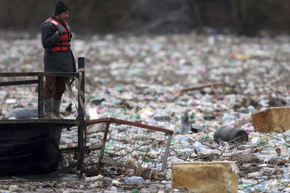 Waste plastic in the Lim river near Priboj, Serbia in January.