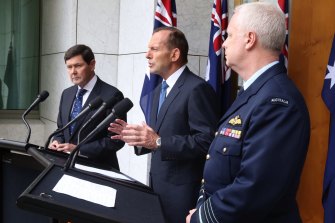 Kevin Andrews (left) was defence minister in  Tony Abbott’s government.