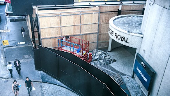 Construction hoardings surround the 1100 seat Theatre Royal. 