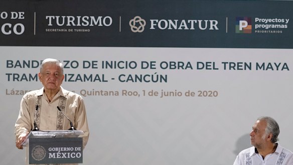 Mexican President Andres Manuel Lopez Obrador, left, at the launch of the Mayan train project.