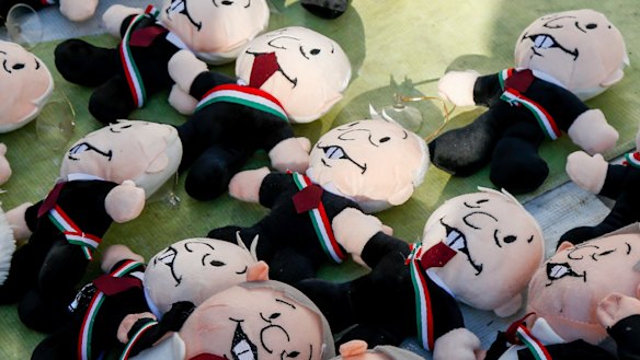 Miniature dolls depicting Mexico's newly sworn-in President Andres Manuel Lopez Obrador are displayed for sale at the Zocalo, in Mexico City, on Saturday.