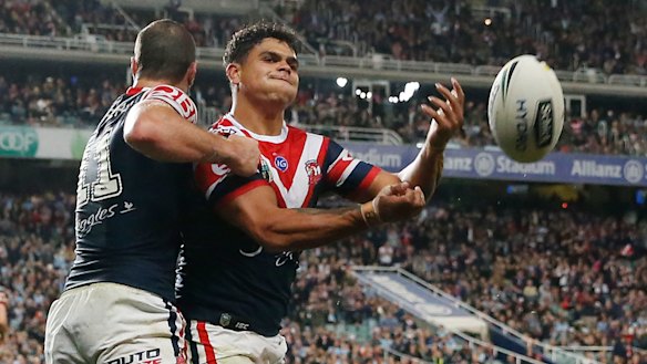 X-factor: Mitchell scores a try during the qualifying final against the Sharks at Allianz Stadium.