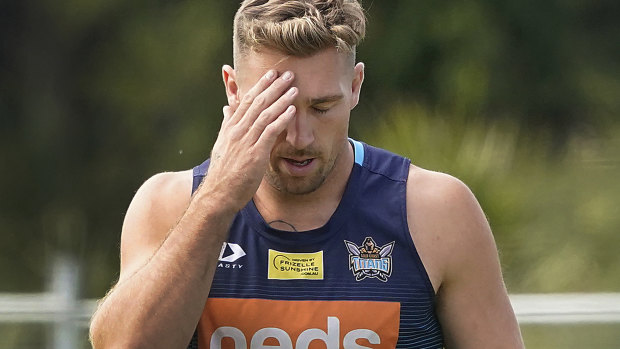 Gold Coast player Bryce Cartwright is resisting the flu shot.