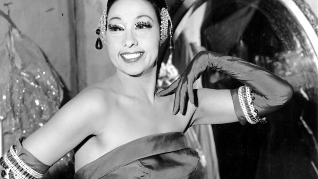 Josephine Baker poses in her dressing room at the Strand Theatre in New York City in 1961.