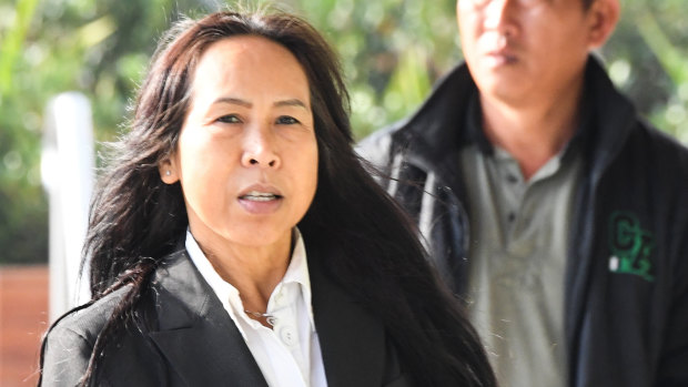 Mr Mokmool's mother Supaporn Chomphoo arrives at the inquest in May.