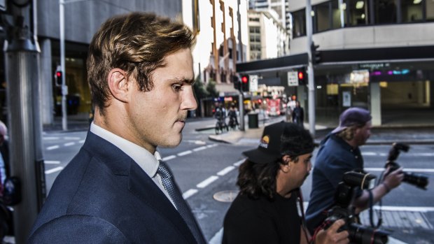 Jack de Belin leaves Downing Centre Court on May 10 after his second trial ended in a hung jury.