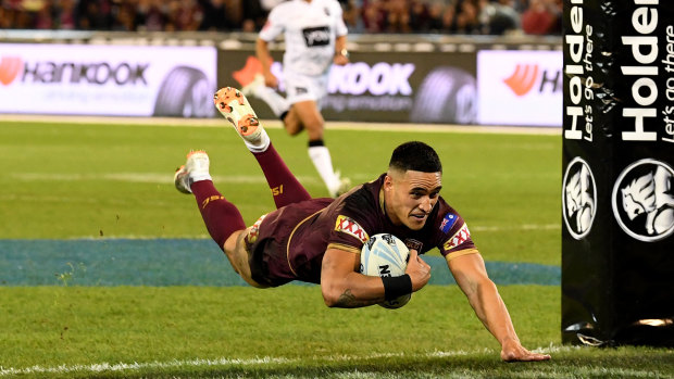 Valentine Holmes scores for the Maroons in game one.