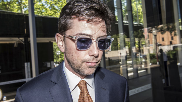 AFR columnist Joe Aston leaving the Federal Court on Monday.