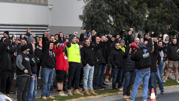 Hundreds of CFMMEU workers protesting outside the Hawthorn East building site on Wednesday morning. Victoria Police said it would fine the organiser. 