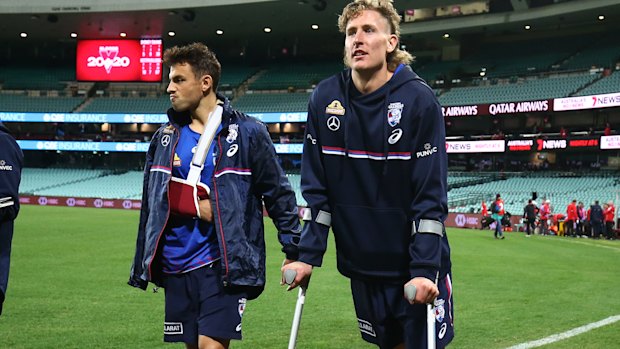 Sam Lloyd and Aaron Naughton after the Bulldogs' win over Sydney. 