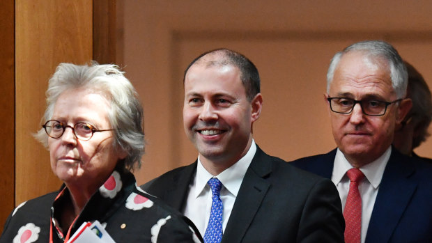 Kerry Schott, chair of the Energy Security Board, with Josh Frydenberg (middle), the environment and energy minister, and Prime Minister Malcolm Turnbull.