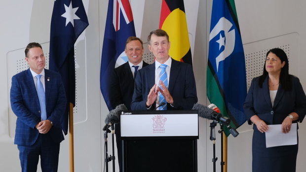 Former Brisbane lord mayor Graham Quirk speaks at a press conference fronted by Premier Steven Miles (second from left), Lord Mayor Adrian Schrinner and Grace Grace.