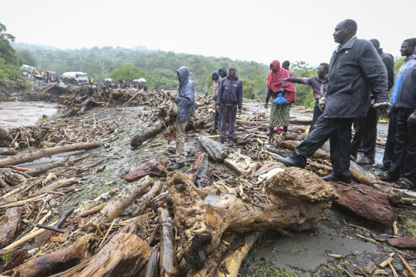 Floodwaters surge along the road from Kapenguria, in western Kenya, near where dozens of people have been killed in mudslides.