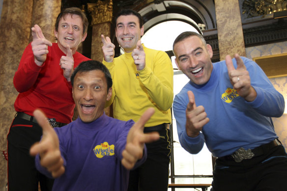 A 2006 file photo of The Wiggles, featuring Murray Cook (Red Wiggle), Greg Page (Yellow Wiggle), Jeff Fatt (Purple Wiggle), and Anthony Field (Blue Wiggle).
