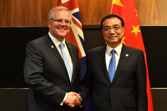Scott Morrison, pictured with Chinese Premier Li Keqiang in 2018, is yet to visit China since becoming Prime Minister. 
