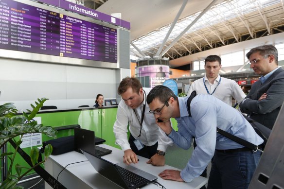 Airport staff in Kiev, Ukraine, struggle to get computers running during the NotPetya attack of July 2017.