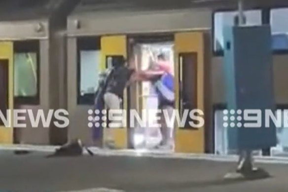 A fight broke out between two men on a stationary train at Redfern Station. 