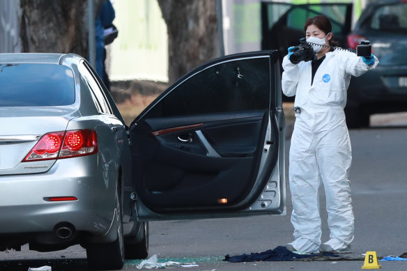 Bullet holes in the car window of one of the vehicles in Greenacre.