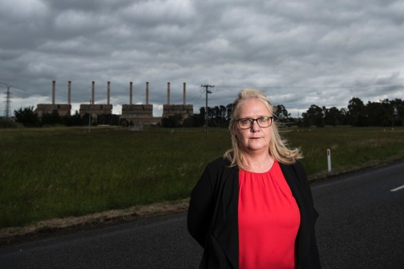 Wendy Farmer, in front of Hazelwood power plant in 2016, formed community group Voices of the Valley and says there's no reason the Latrobe Valley couldn't become a renewable energy hub.