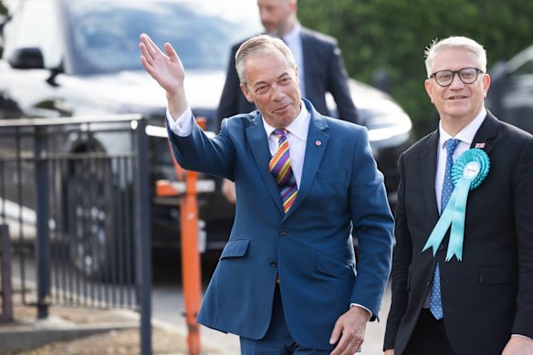 Reform UK leader Nigel Farage (left) with local MP Andrew Rosindell outside Havering Town Hall following the local election in Romford.