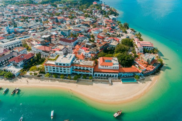 Houses hug the coast in Stone town, Zanzibar.