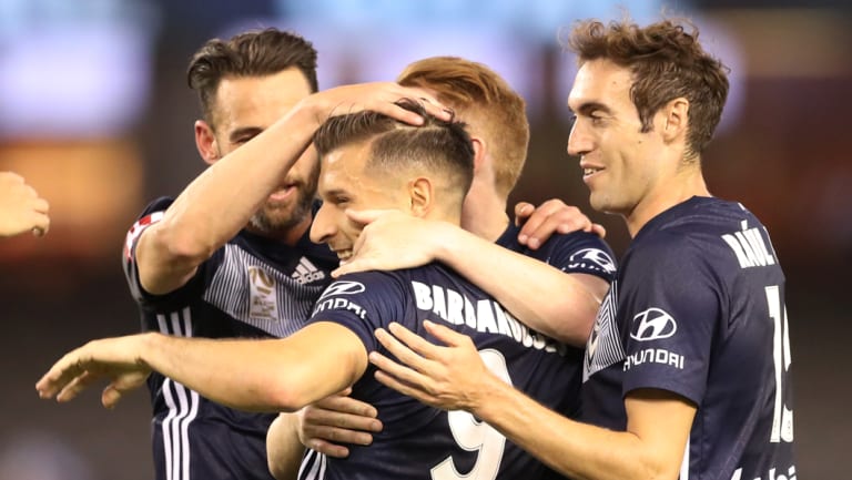 Kosta Barbarouses is congratulated after slotting a penalty for Victory.