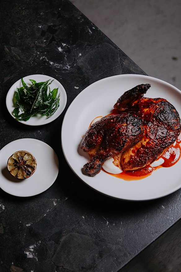 Agnes restaurant’s harissa chicken with labneh and lime.