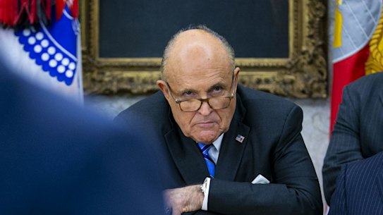 Rudy Giuliani, centre, former mayor of New York, now a lawyer to Donald Trump.