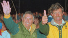 Alan Bond and John Bertrand celebrate victory in Newport on September 26, 1983.