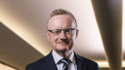 Who should sit with the Governor in the RBA’s board room?