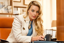 An AI-generated image of Margot Robbie at the prime minister’s desk that used a real photo of Scott Morrison as a reference.