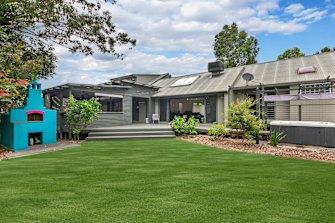The Kelly family’s Narara home has a pizza oven, spa and vegie garden.