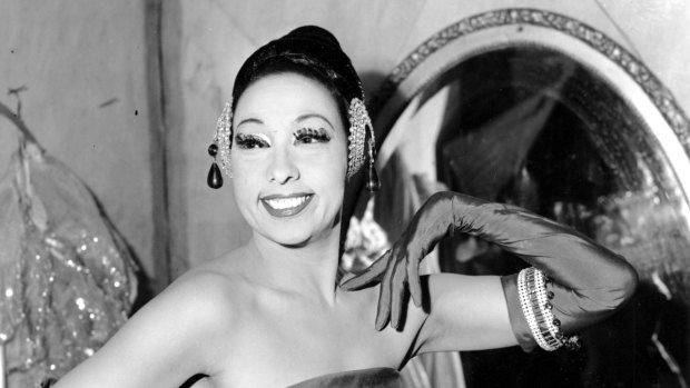 Josephine Baker poses in her dressing room at the Strand Theater in New York City in 1961.