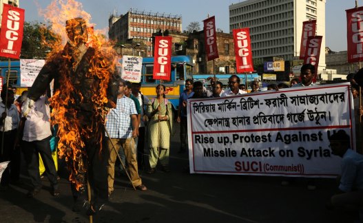 A protest in India against the missile strikes in Syria.